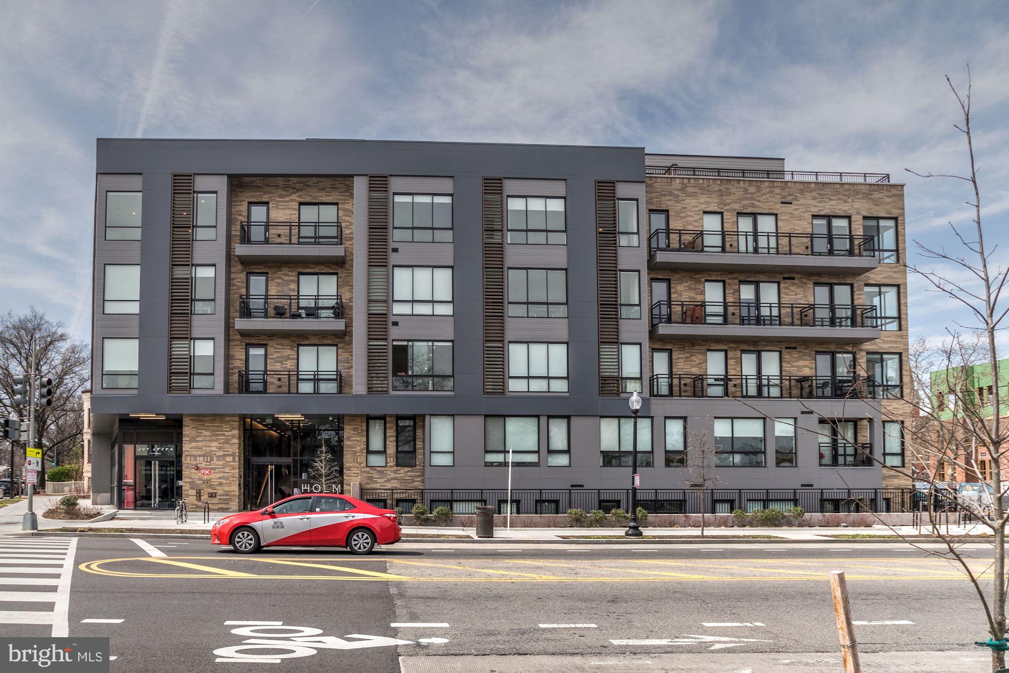 1550 11th Street Northwest, Unit 307 Washington, DC 20005 - Photo 22 of 22 a building in the street side