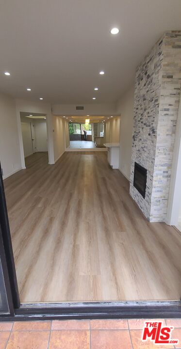 1557 South Beverly Glen Boulevard, Unit 104 Los Angeles, CA 90024 - Photo 15 of 44 a view of empty room with a fireplace