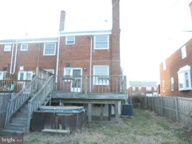 1931 Quentin Road Baltimore, MD 21222 - Photo 2 of 13 a view of a brick building next to a yard