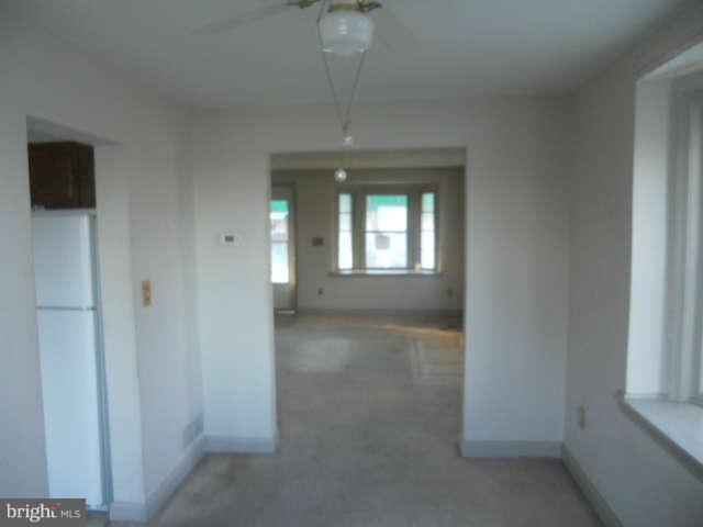 1931 Quentin Road Baltimore, MD 21222 - Photo 7 of 13 a view of livingroom with chandelier