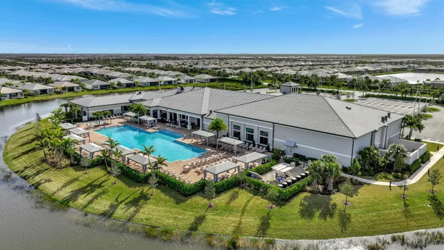 an aerial view of a house with a ocean view