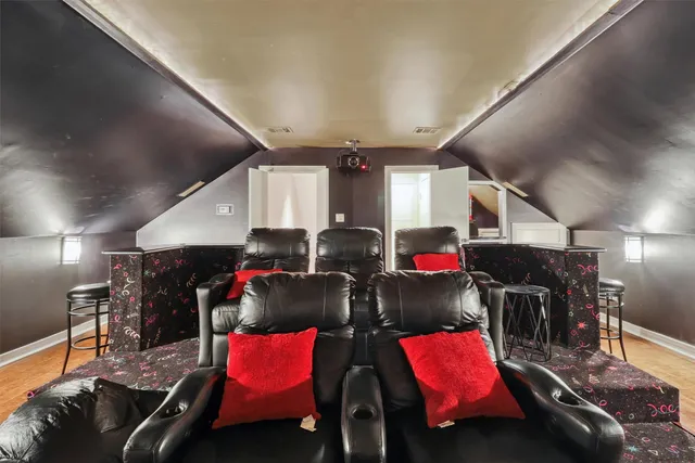 a garage room with furniture and air hockey table