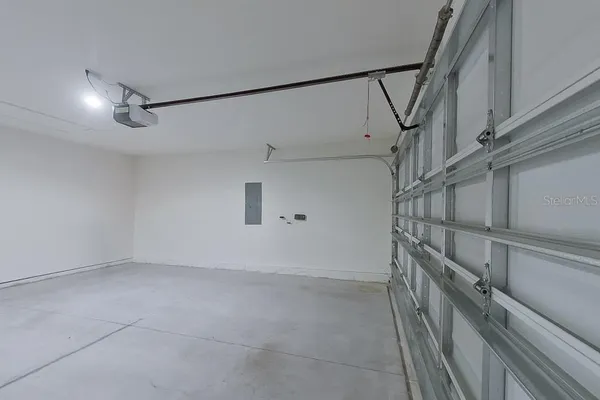 a view of a hallway with staircase