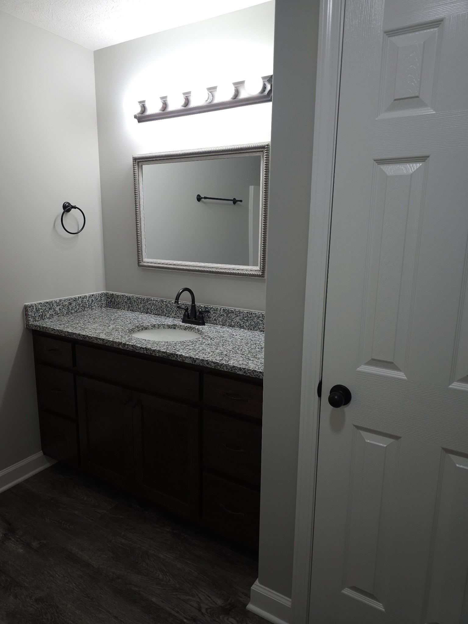 4020 Hartsville Road Lafayette, TN 37083 - Photo 13 of 19 a bathroom with a sink and a mirror