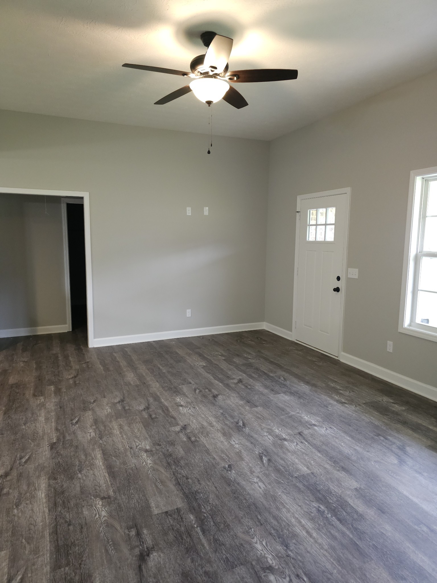 4020 Hartsville Road Lafayette, TN 37083 - Photo 5 of 19 a view of an empty room with a window