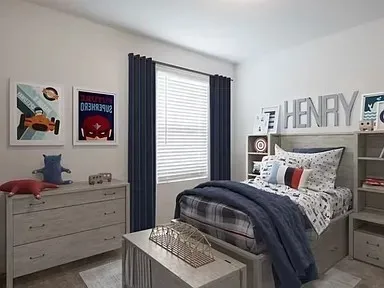 a bedroom with a bed and a cabinet