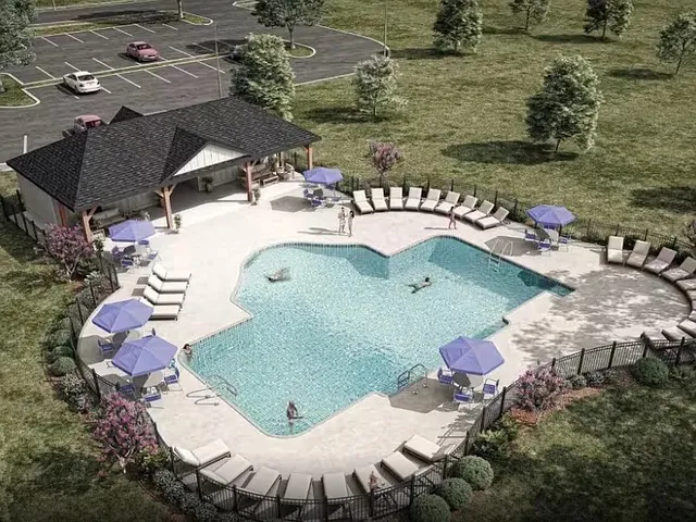 an aerial view of a house with outdoor space