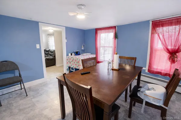 a view of a dining room with furniture