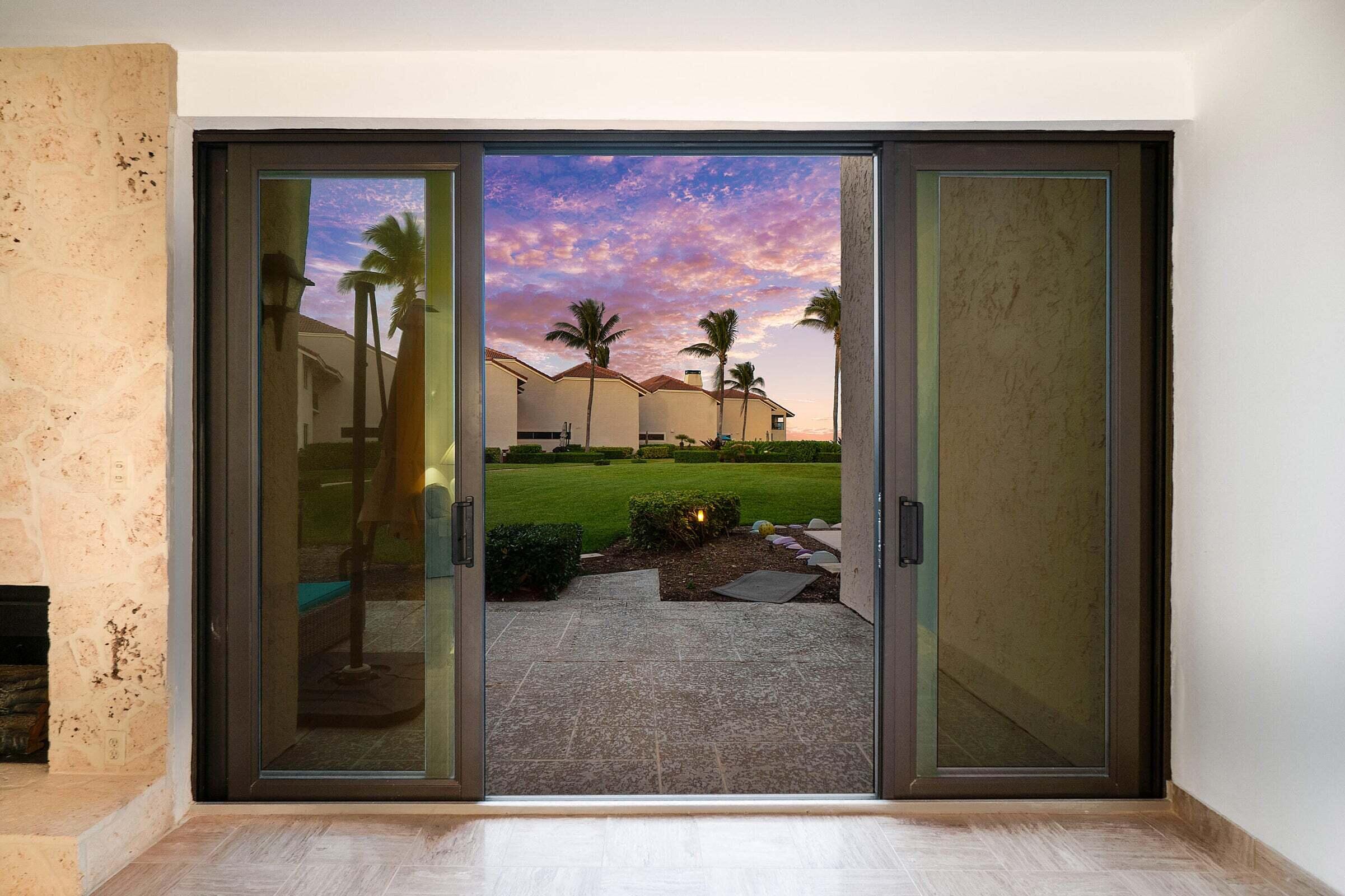 6711 North Ocean Boulevard, Unit 13 Ocean Ridge, FL 33435 - Photo 13 of 50 a view of a entryway door front of house