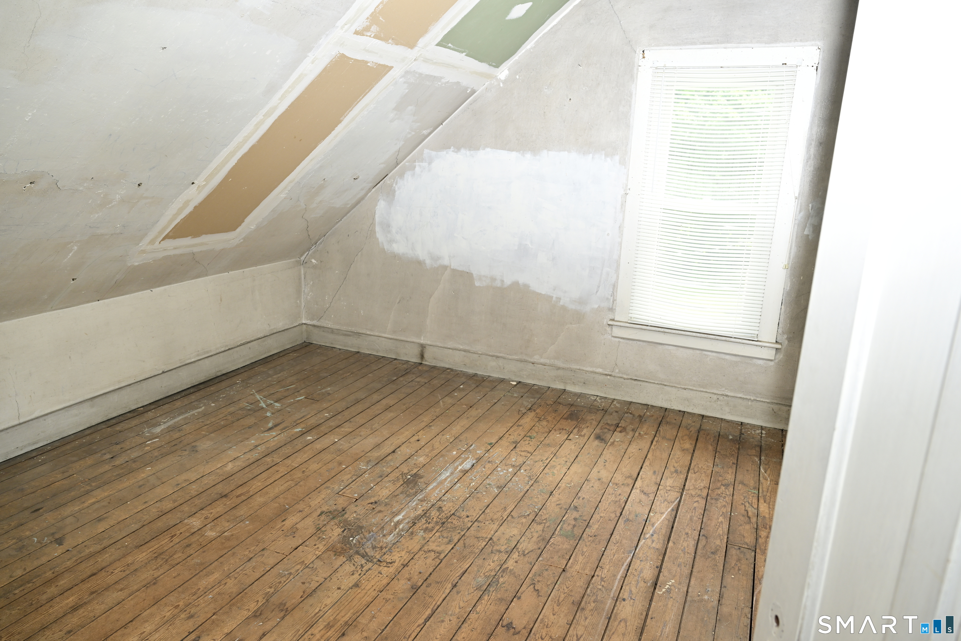 29 Locke Street Ansonia, CT 06401 - Photo 16 of 39 Right side Unit Attic . Lots of space ! A blank canvas for your imagination.
