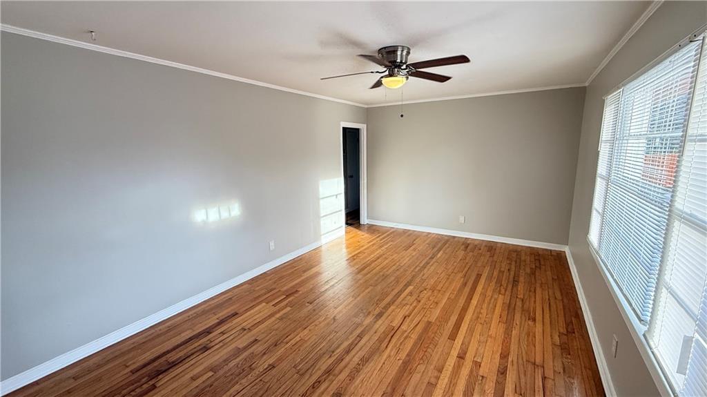 43 Bell Street Hartwell, GA 30643 - Photo 5 of 15 wooden floor in an empty room with a window
