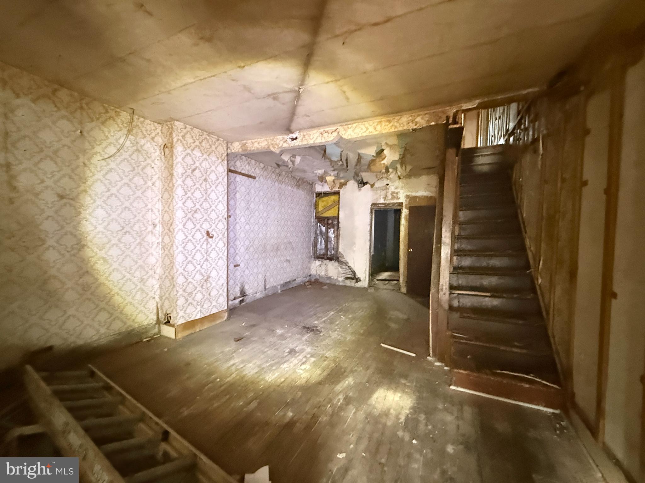 6327 Wheeler Street Philadelphia, PA 19142 - Photo 11 of 36 a view of a room with stairs