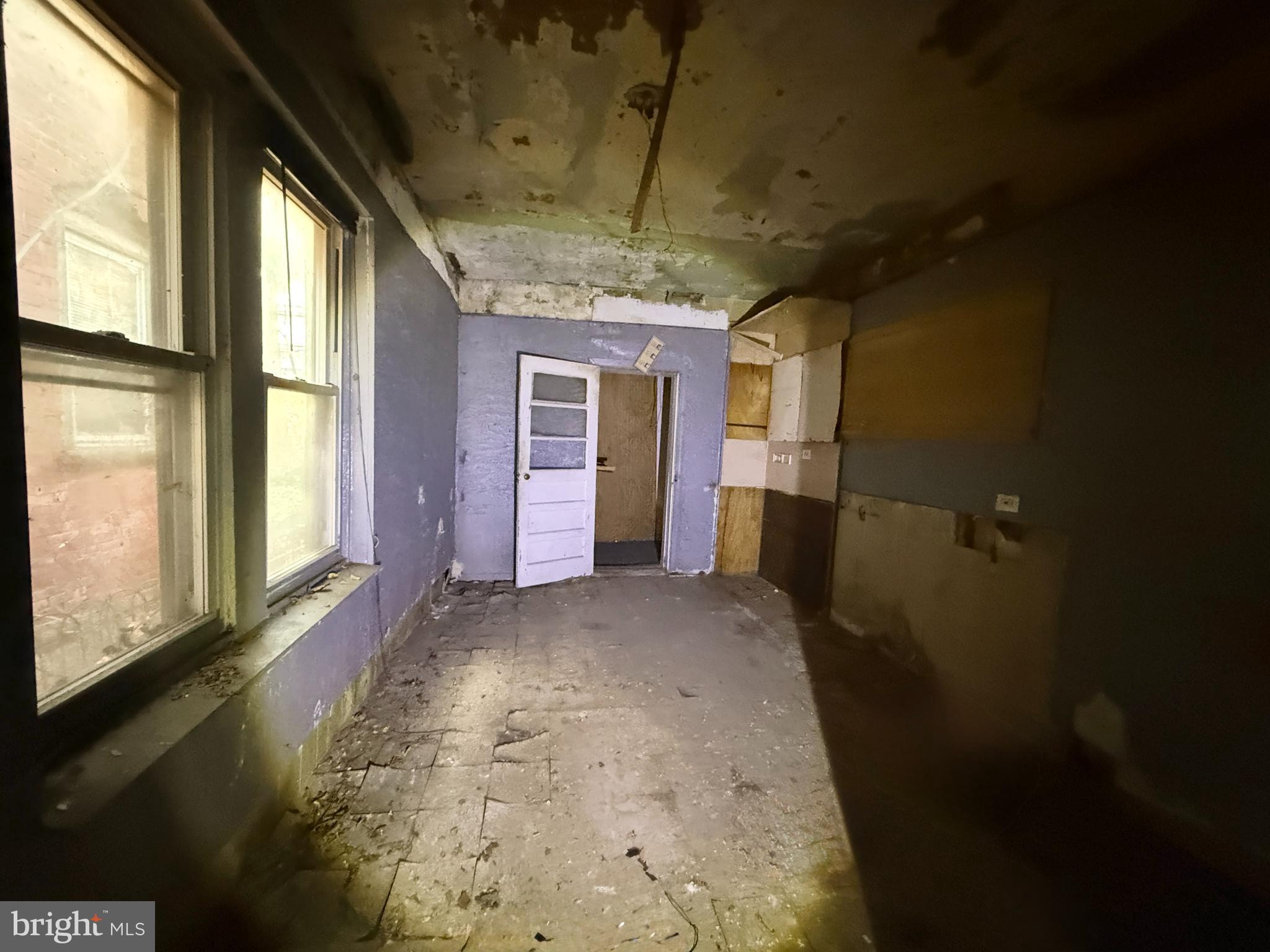 6327 Wheeler Street Philadelphia, PA 19142 - Photo 18 of 36 a view of a hallway with a window