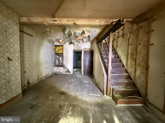 a view of a hallway with staircase