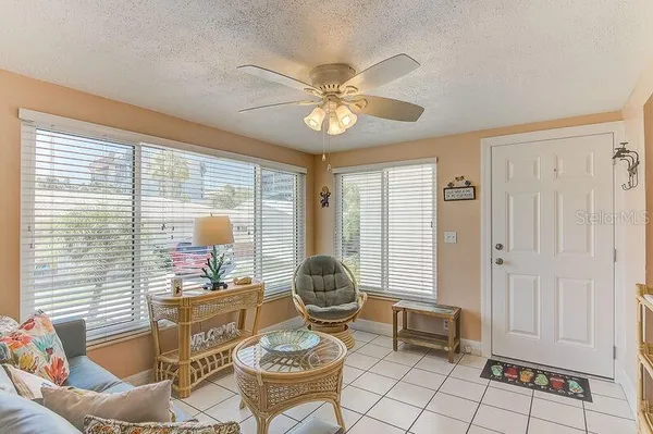 a living room with furniture and a window