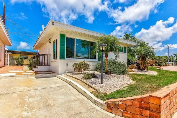 a view of a house with a patio