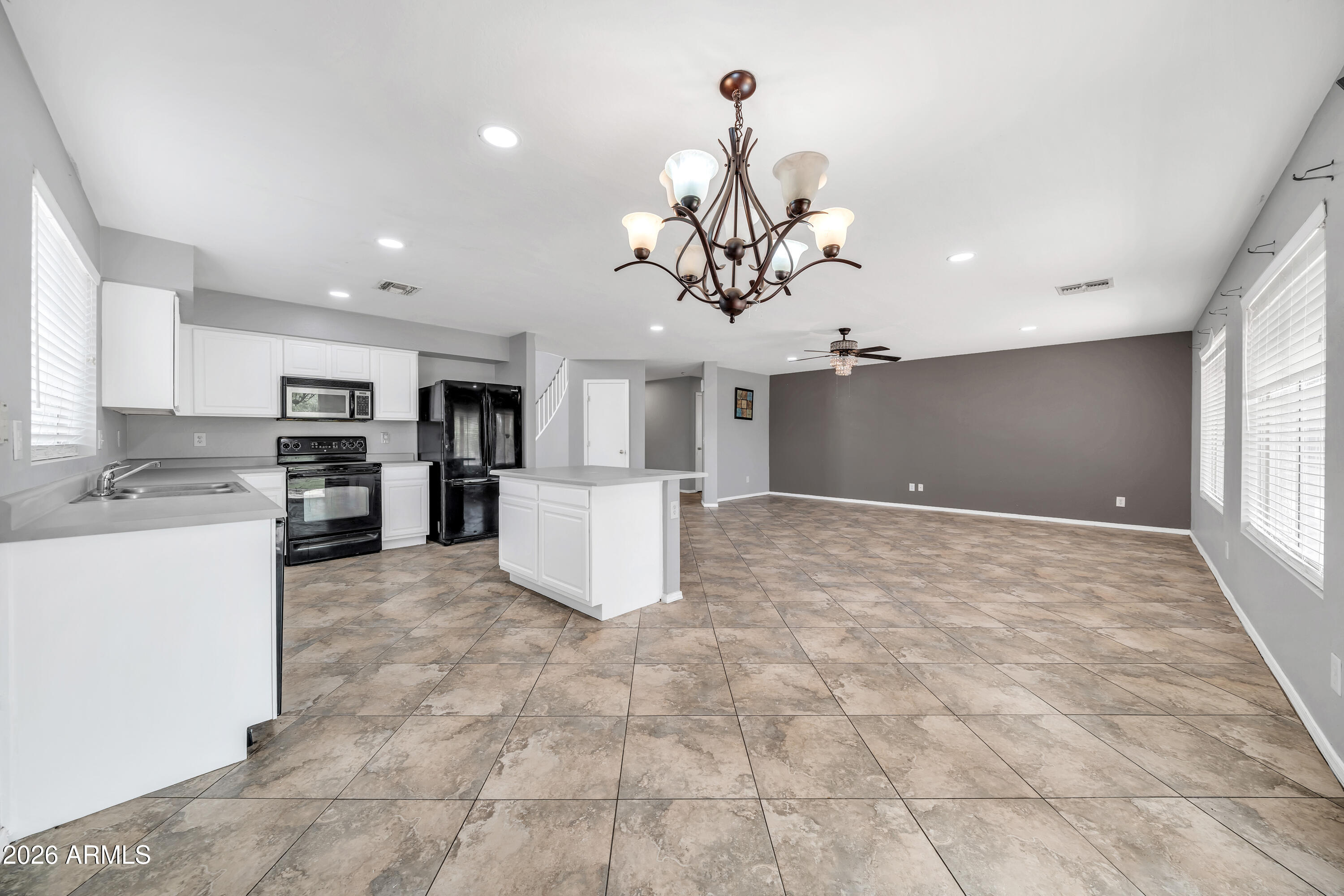 2913 West Fremont Rd. Phoenix, AZ 85041 - Photo 5 of 26 Kitchen and Great Room