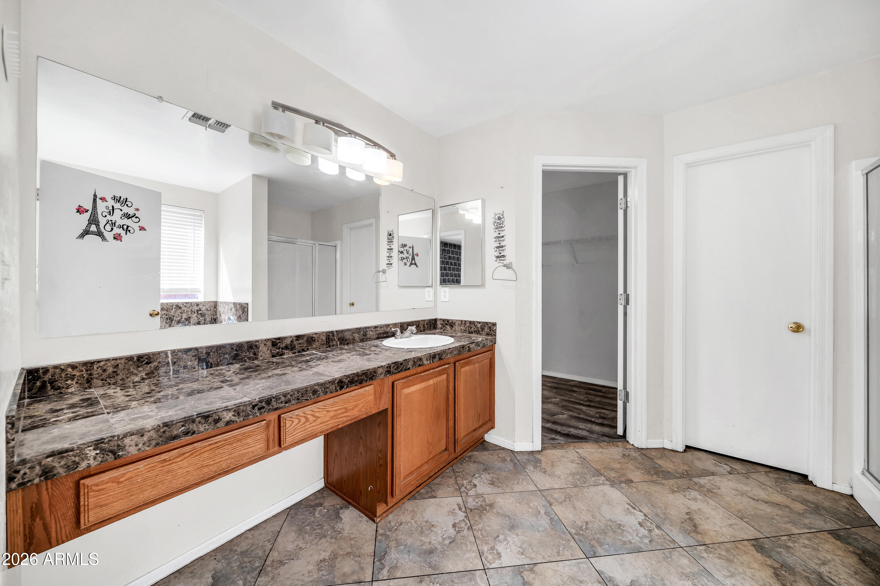 2913 West Fremont Rd. Phoenix, AZ 85041 - Photo 7 of 26 Downstairs Primary Bath 1