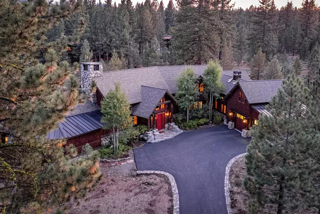 a view of a house with a flower garden