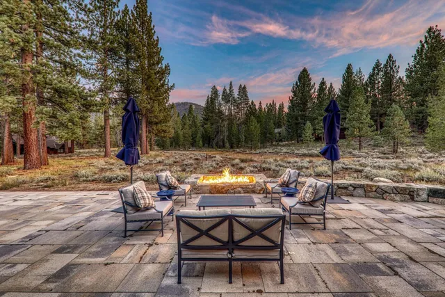 a view of swimming pool with outdoor seating
