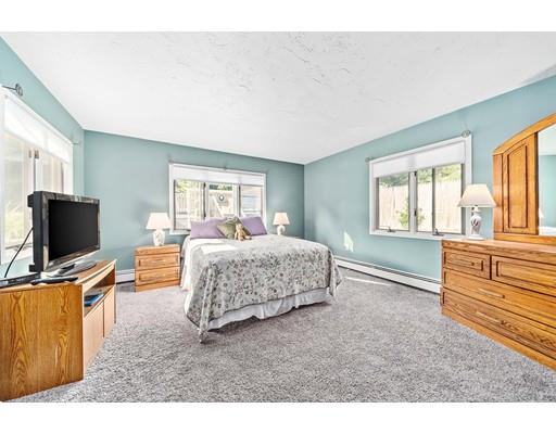134 Summit Road Abington, MA 02351 - Photo 11 of 22 a living room with furniture and a flat screen tv