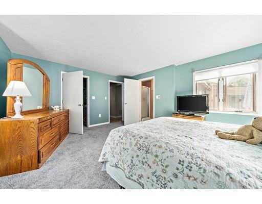 134 Summit Road Abington, MA 02351 - Photo 12 of 22 a living room with a bed furniture and a flat screen tv
