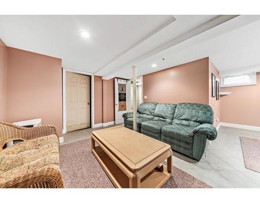 134 Summit Road Abington, MA 02351 - Photo 15 of 22 a living room with furniture and a flat screen tv