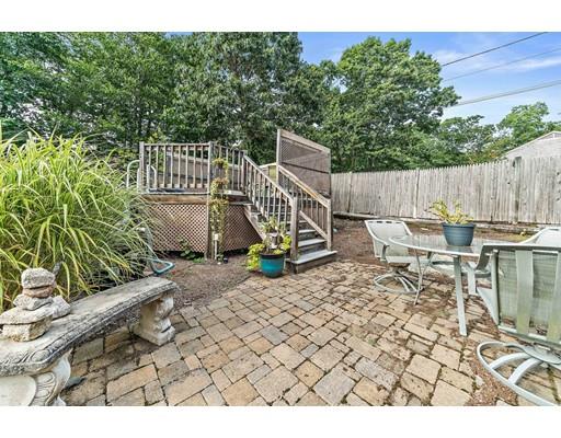 134 Summit Road Abington, MA 02351 - Photo 18 of 22 a view of a chair and tables in the backyard