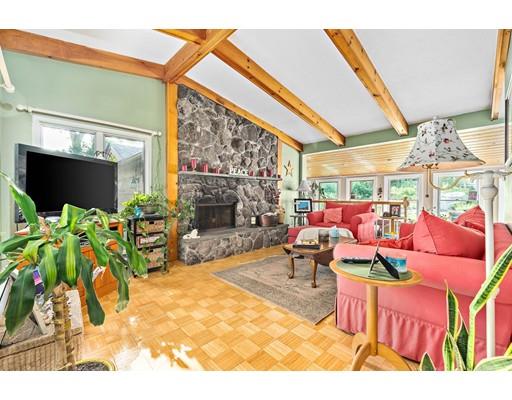 134 Summit Road Abington, MA 02351 - Photo 2 of 22 a outdoor living space with furniture and a potted plant