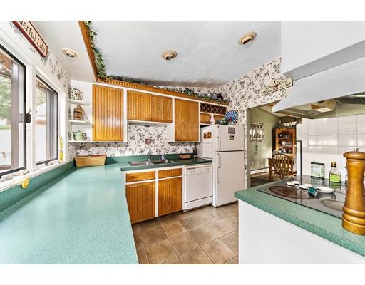134 Summit Road Abington, MA 02351 - Photo 6 of 22 a kitchen with stainless steel appliances granite countertop a sink and a stove