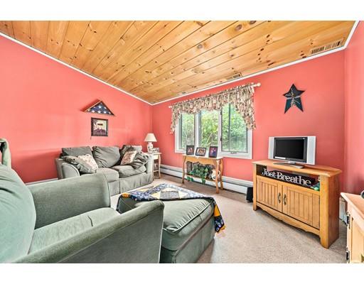 134 Summit Road Abington, MA 02351 - Photo 8 of 22 a living room with furniture and a flat screen tv