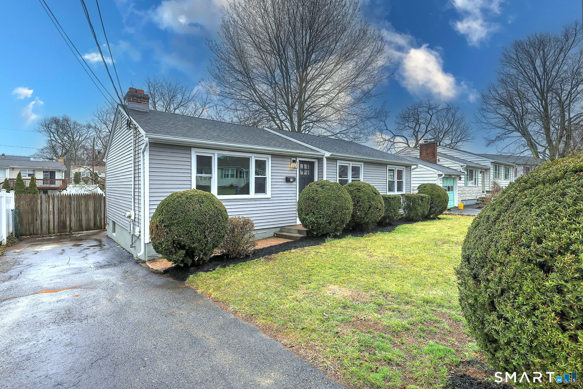 19 Harding Avenue West Haven, CT 06516 - Photo 1 of 39 a view of a house with a yard and potted plants