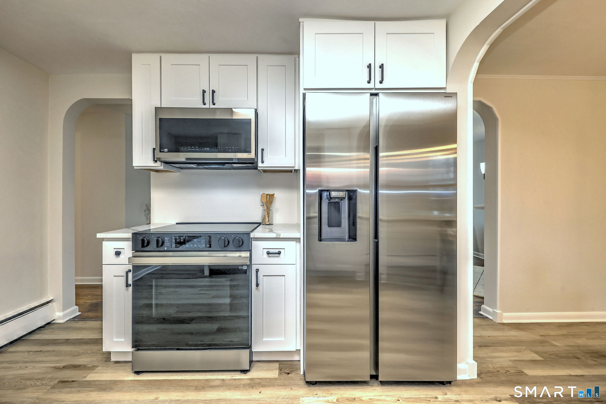 19 Harding Avenue West Haven, CT 06516 - Photo 13 of 39 a kitchen with a refrigerator and a stove