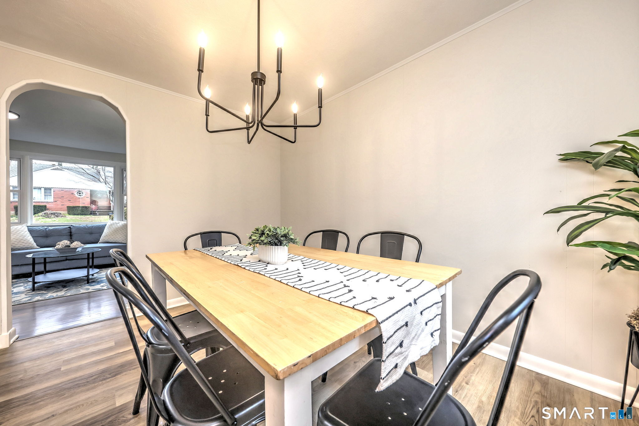 19 Harding Avenue West Haven, CT 06516 - Photo 20 of 39 a view of a dining room with furniture and a chandelier