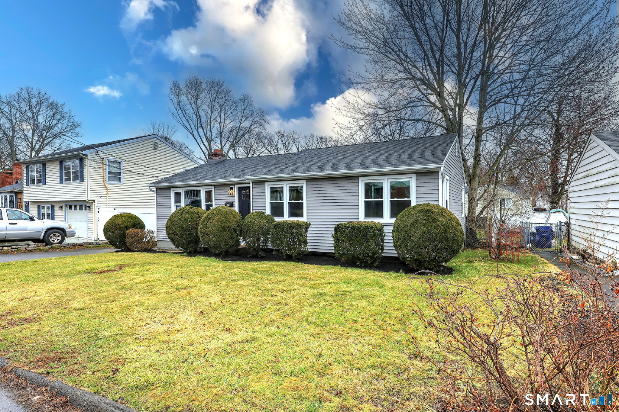 19 Harding Avenue West Haven, CT 06516 - Photo 3 of 39 a view of a house with backyard and sitting area