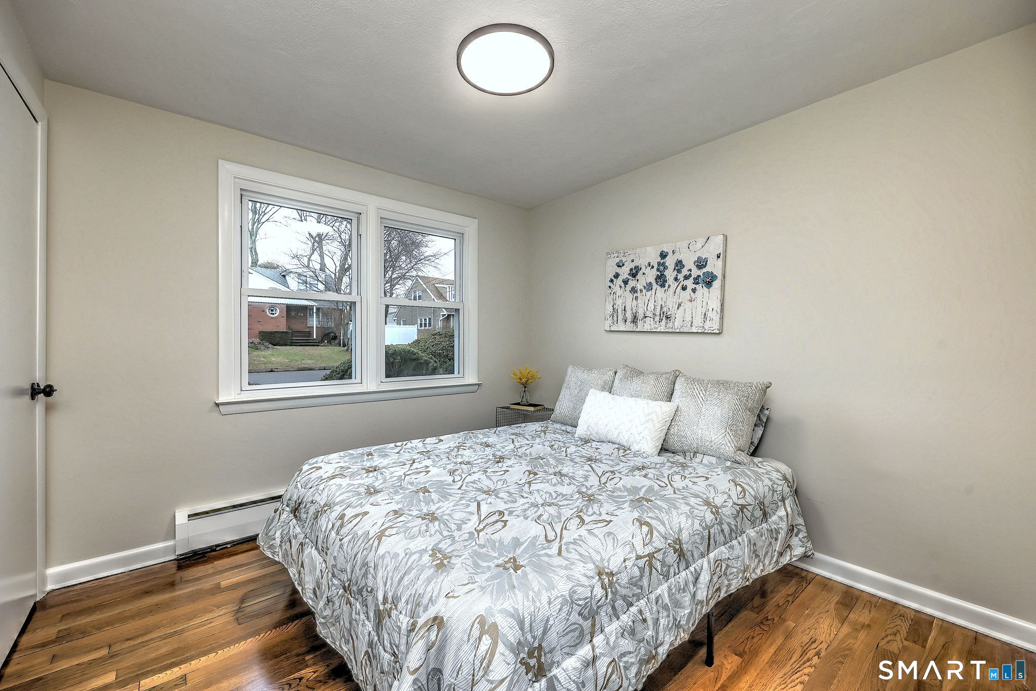 19 Harding Avenue West Haven, CT 06516 - Photo 31 of 39 a bedroom with a bed and a window