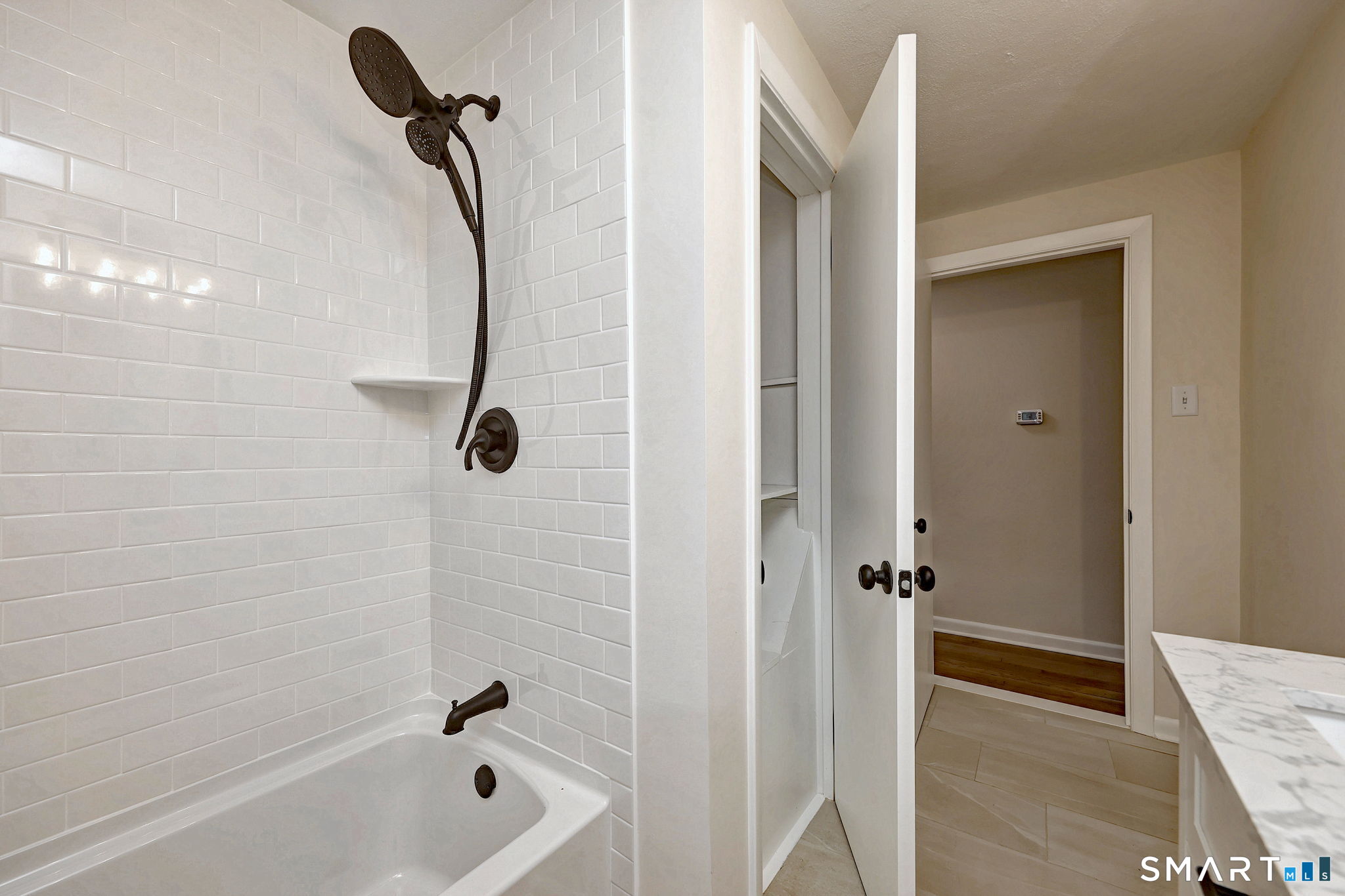 19 Harding Avenue West Haven, CT 06516 - Photo 33 of 39 a bathroom with a shower