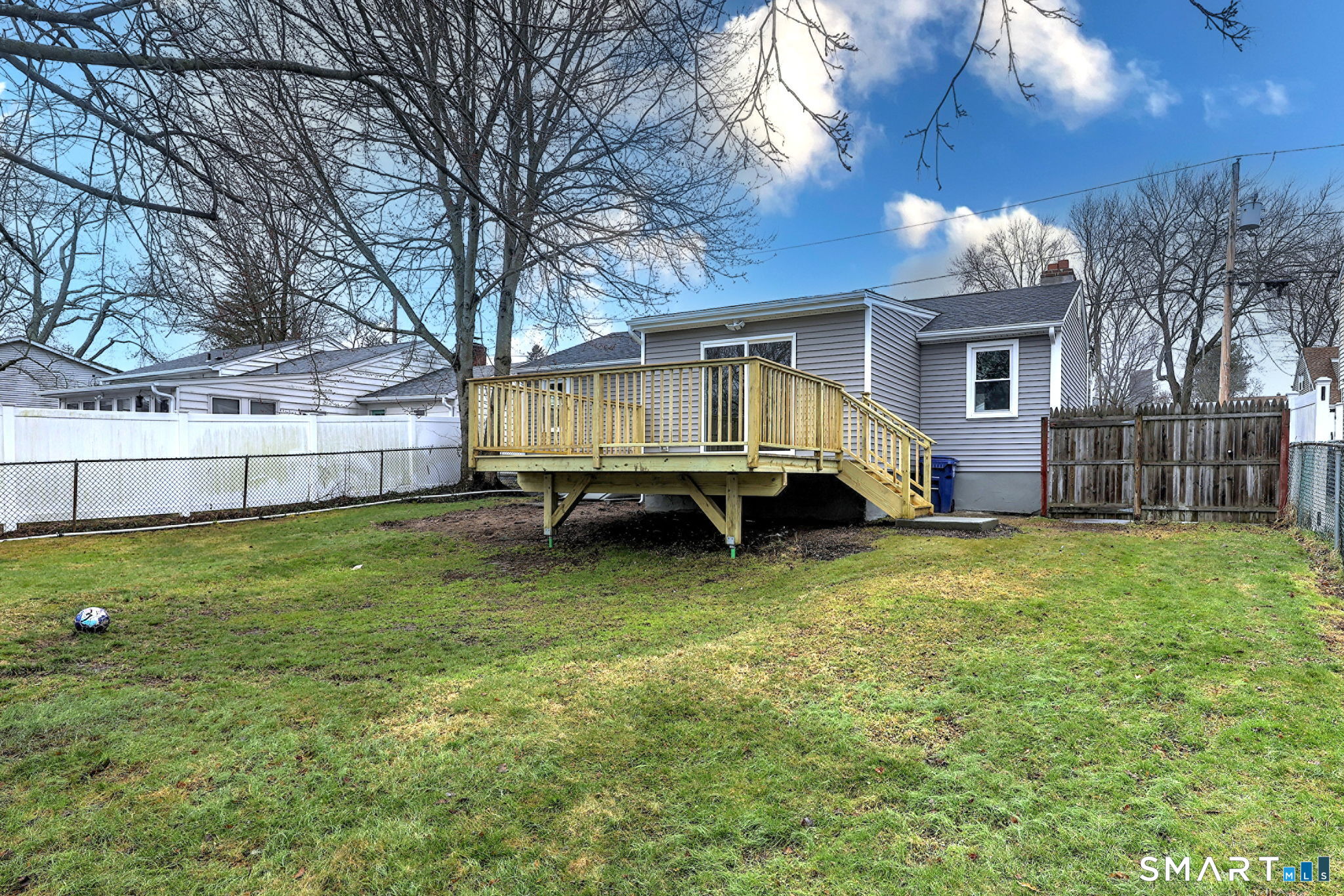 19 Harding Avenue West Haven, CT 06516 - Photo 37 of 39 a front view of house with yard slide and large tree