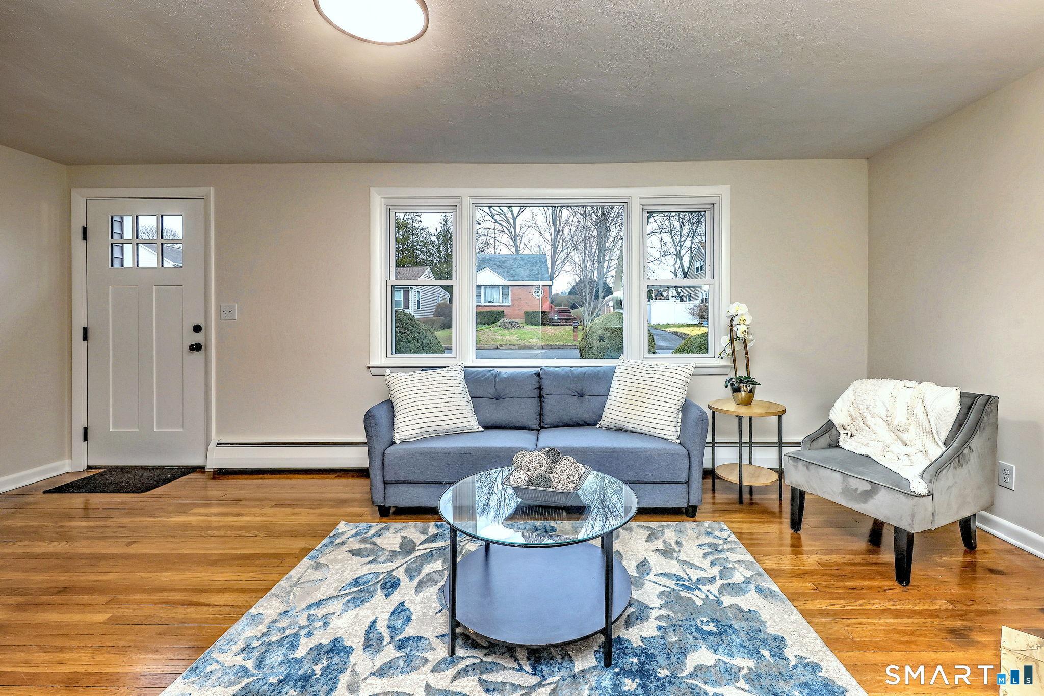 19 Harding Avenue West Haven, CT 06516 - Photo 6 of 39 a living room with furniture and a window