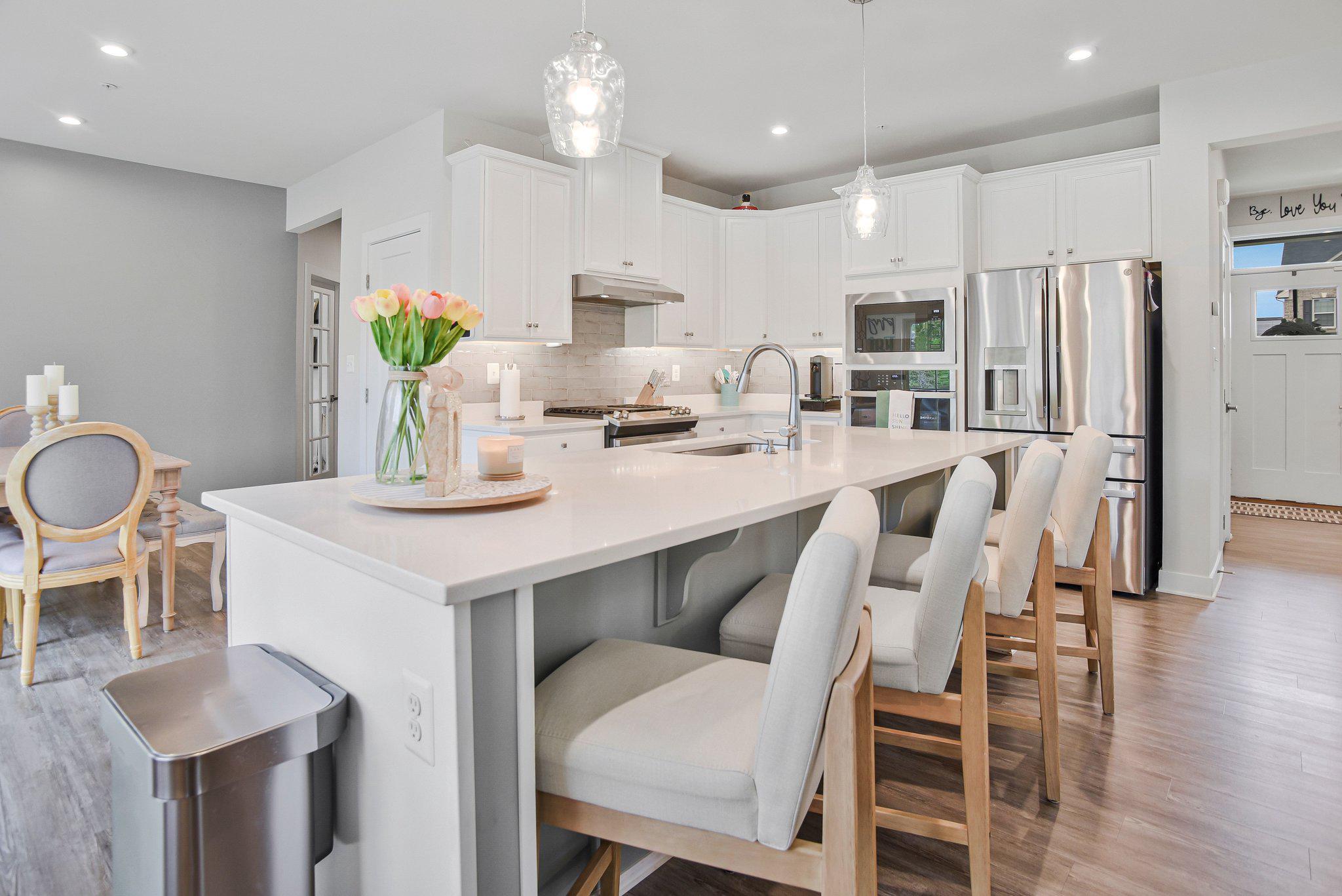 3917 Emory Ridge Road Brandywine, MD 20613 - Photo 12 of 60 Pendant lights highlight the island