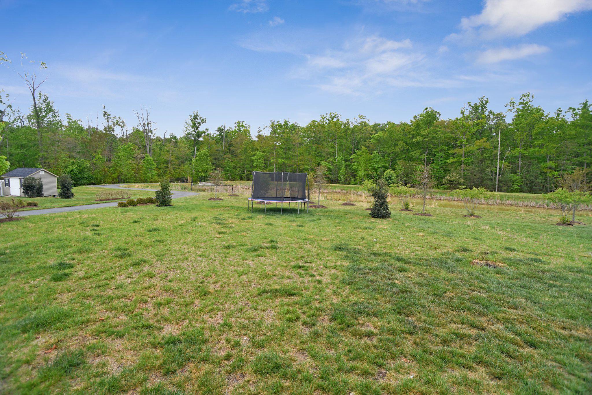 3917 Emory Ridge Road Brandywine, MD 20613 - Photo 51 of 60 Large flat yard that backs to pond/wooded area
