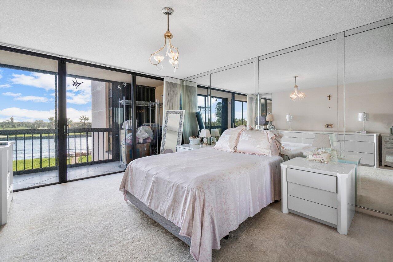 356 Golfview Road, Unit 405 North Palm Beach, FL 33408 - Photo 9 of 18 Primary Bedroom