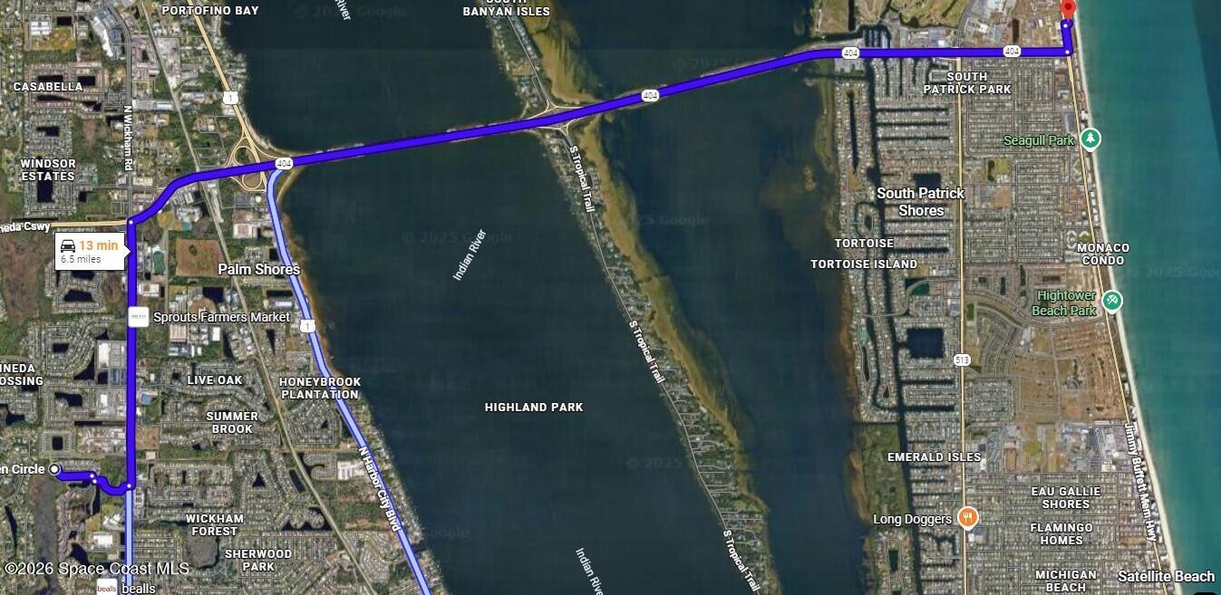 3210 Arden Circle Melbourne, FL 32934 - Photo 39 of 42 a tall building building view with swimming pool