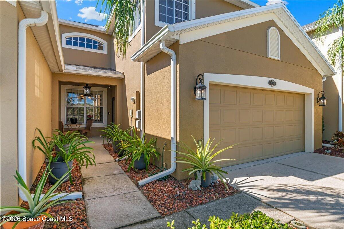 3210 Arden Circle Melbourne, FL 32934 - Photo 6 of 42 a entryway with a glass door