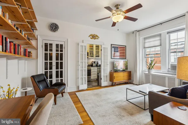 a living room with furniture and a window