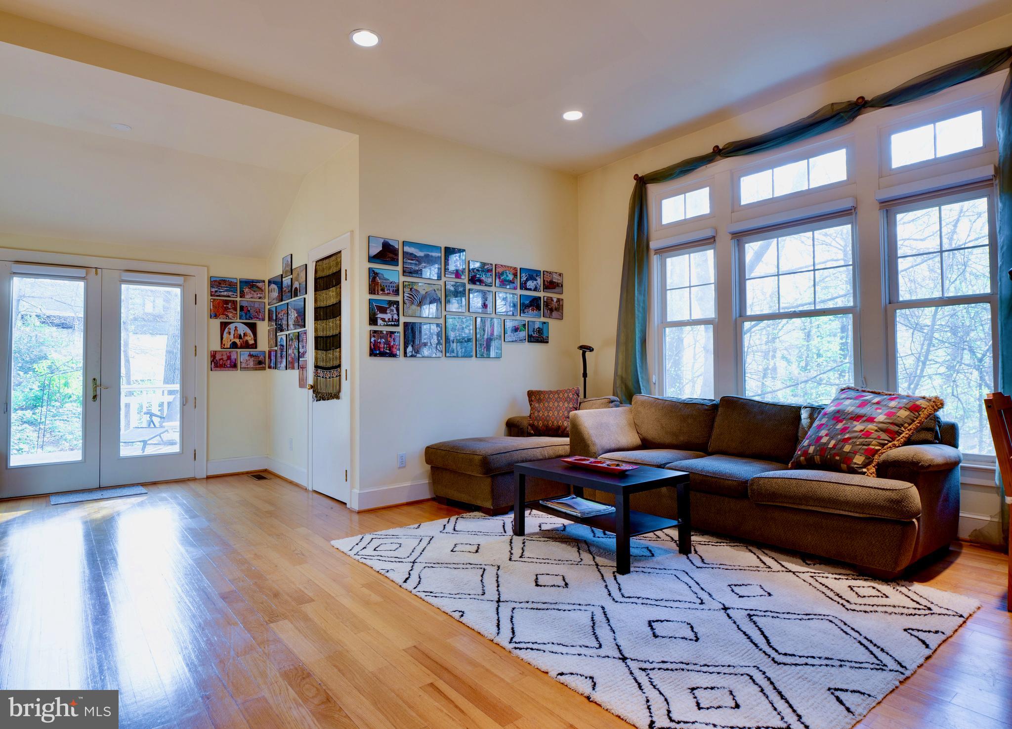 6306 Valley Road Bethesda, MD 20817 - Photo 28 of 74 a living room with furniture and a window