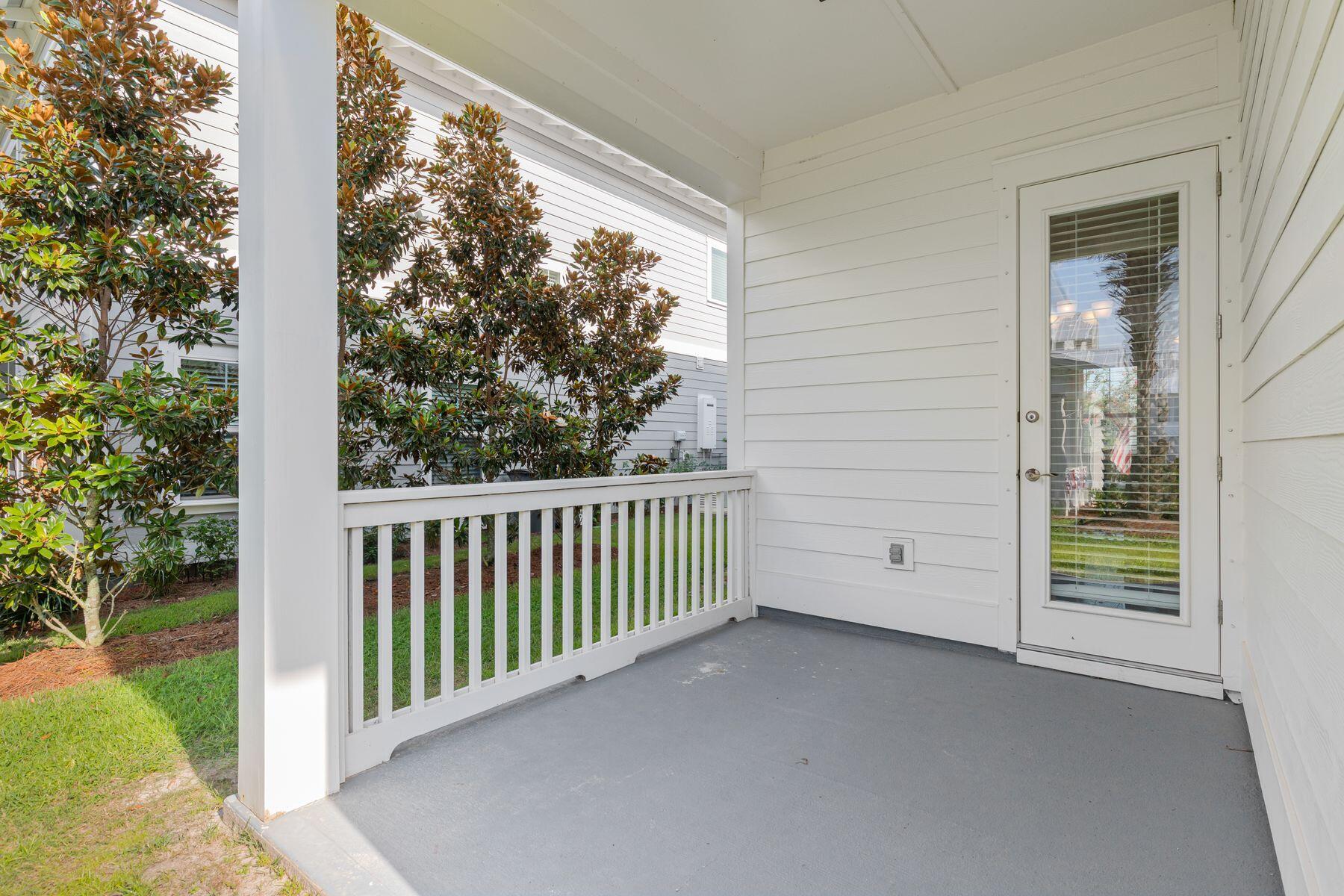 15 Cam Cove Inlet Beach Inlet Beach, FL 32461 - Photo 11 of 35 a view of a porch with a yard