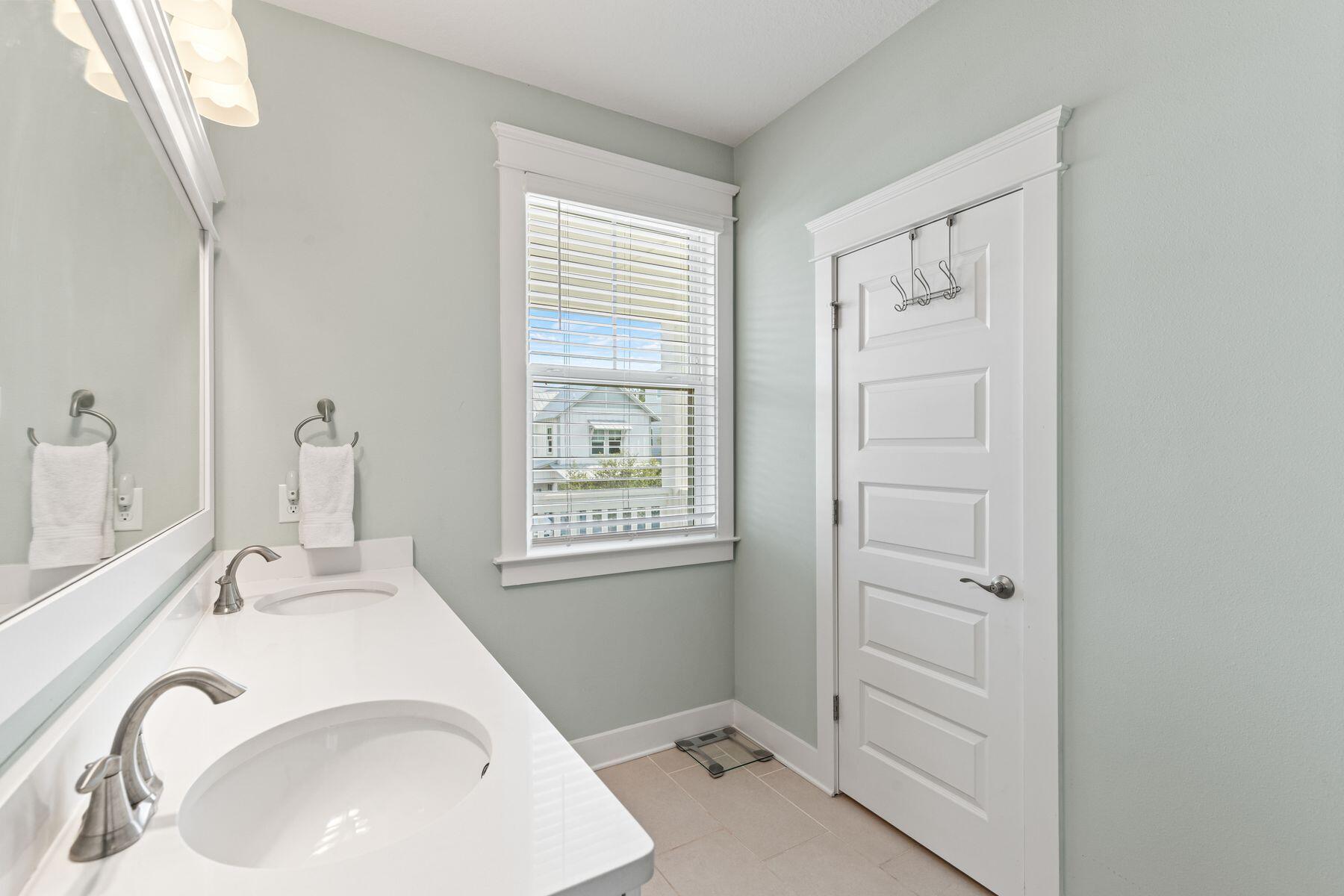 15 Cam Cove Inlet Beach Inlet Beach, FL 32461 - Photo 18 of 35 a bathroom with a sink and a mirror