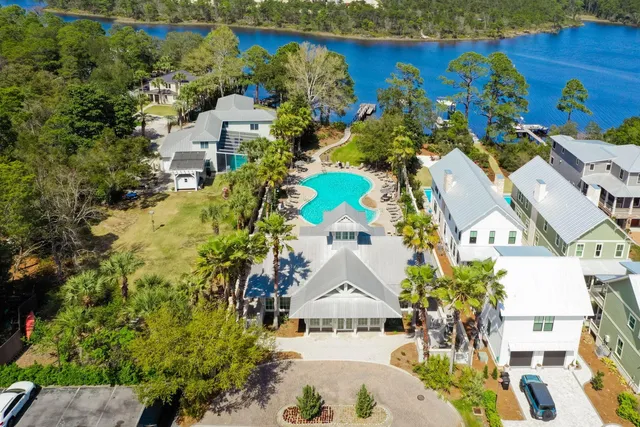 an aerial view of residential house with outdoor space and swimming pool