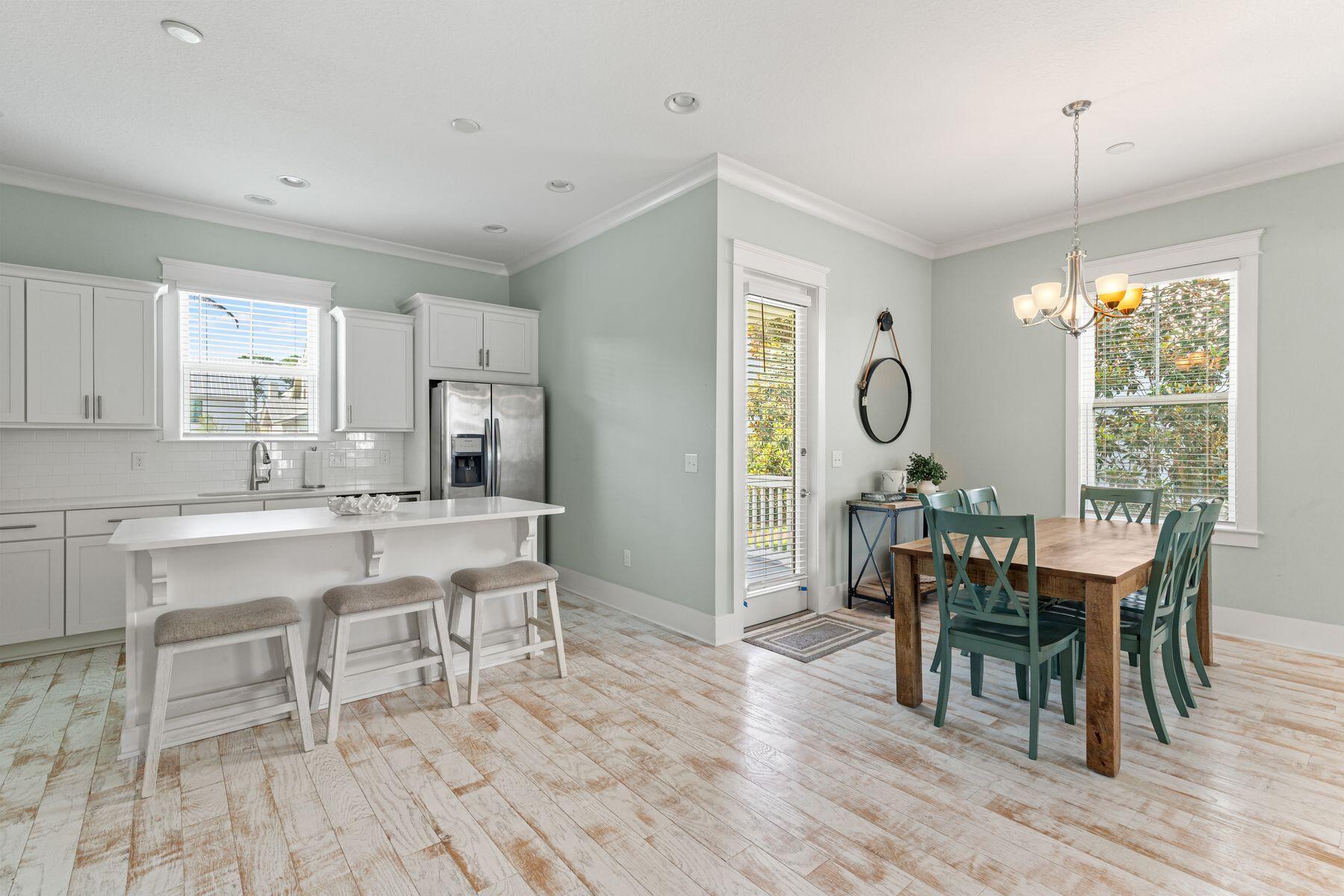 15 Cam Cove Inlet Beach Inlet Beach, FL 32461 - Photo 5 of 35 a view of a dining room with furniture window and wooden floor